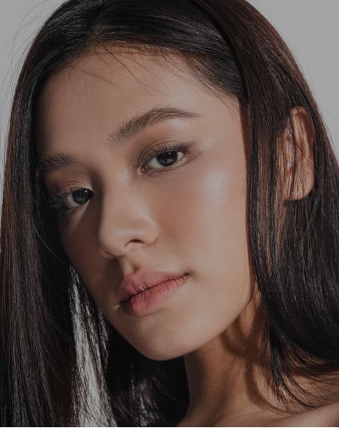 Close-up of a serene woman's face.