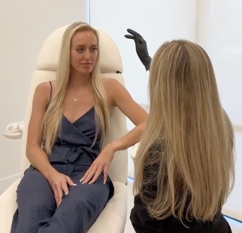 Consultation between two women in clinic setting