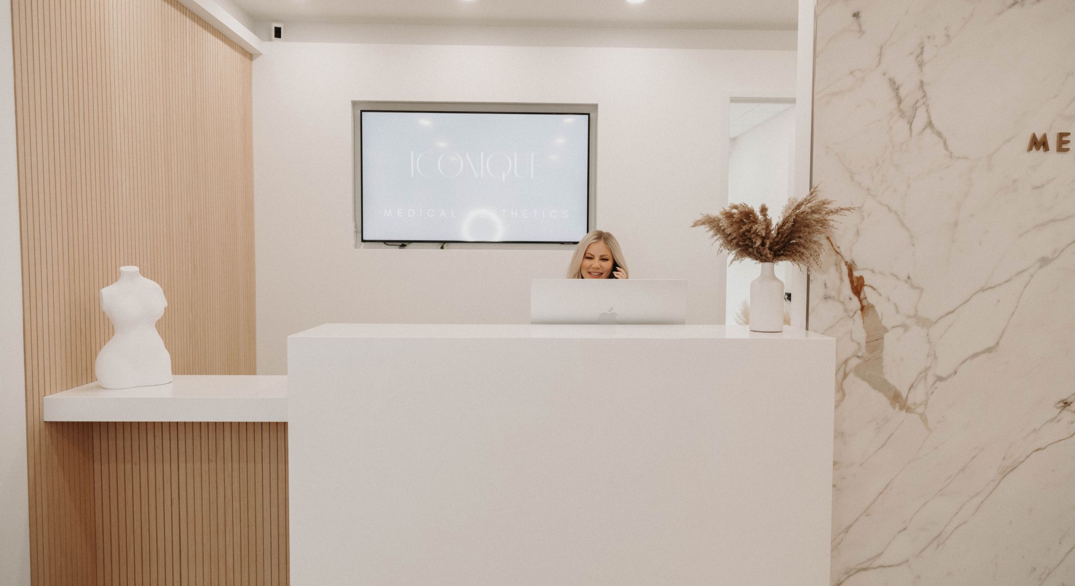 costa mesa shop staff at desk